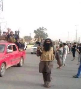 oι μαχητές του Ισλαμικού Κρα΄τους του Ιράκ και της μεγάλης-ισλαμιστικής Συρίας σκορπούν το τρόμο στις πόλεις του Ιράκ