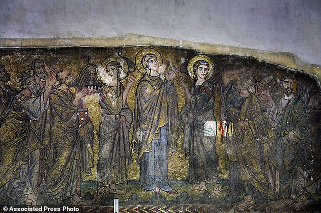 In this Feb. 4, 2016 photo, a mosaic is prepared for renovation inside inside the Church of the Nativity, in the West Bank city of Bethlehem. After two years of painstaking work, experts have completed the initial phase of a delicate restoration project at the Church of the Nativity, giving a much-needed face lift to one of Christianity’s holiest sites. (AP Photo/Nasser Nasser)
