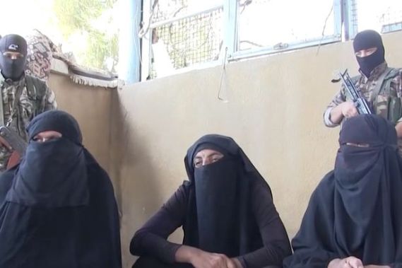 ISIS-fighters-captured-while-fleeing-besieged-town-dressed-as-women